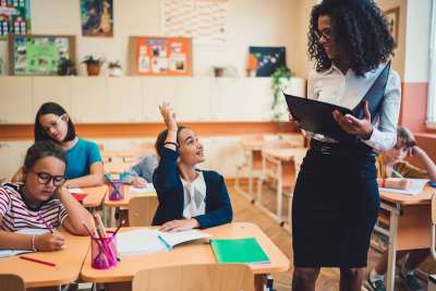 teacher in classroom with kids