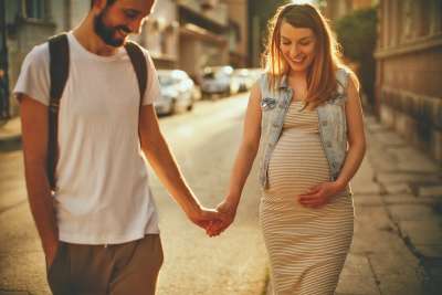 Mom and dad doing Pre-Baby Bucket List activity