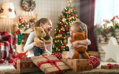 kids opening their 4 gifts on Christmas
