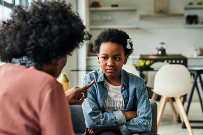 Mother using conscious discipline to correct her child