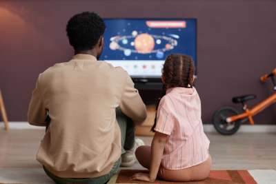 Family watching TV