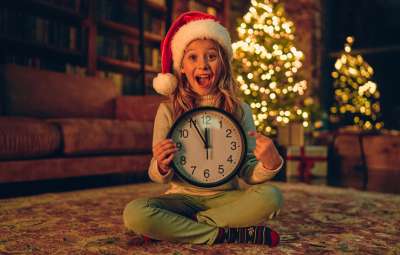Child counting down to New Year's