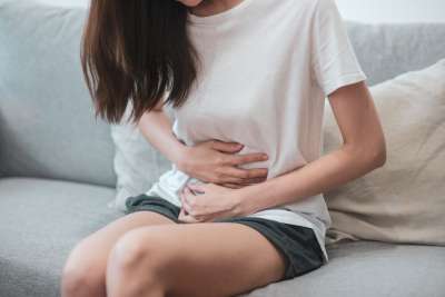 girl with stomach cramps