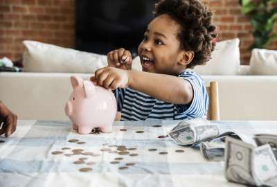 kid with piggy bank