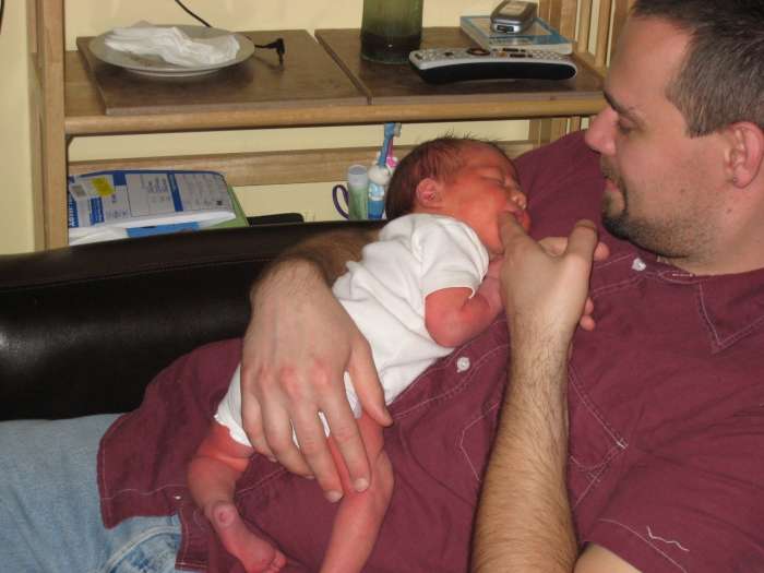 Pregnancy from a dad's point of view - dad with newborn