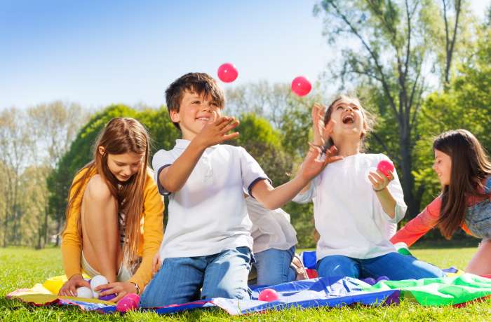 Children playing with colorful balls