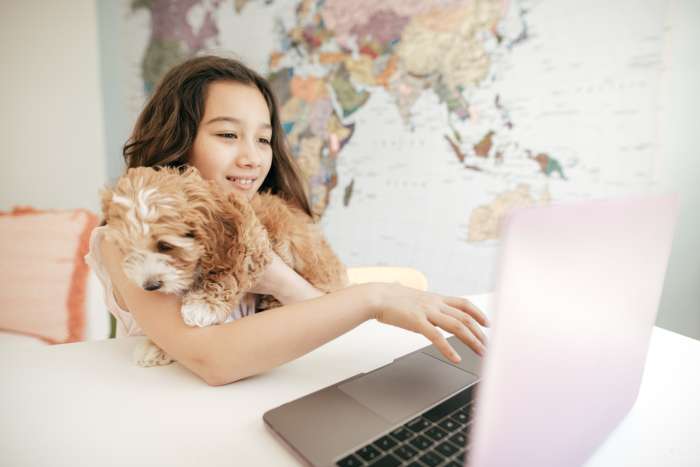 homeschooled girl works on school assignments