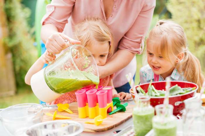 mom making superfood powder popsicles