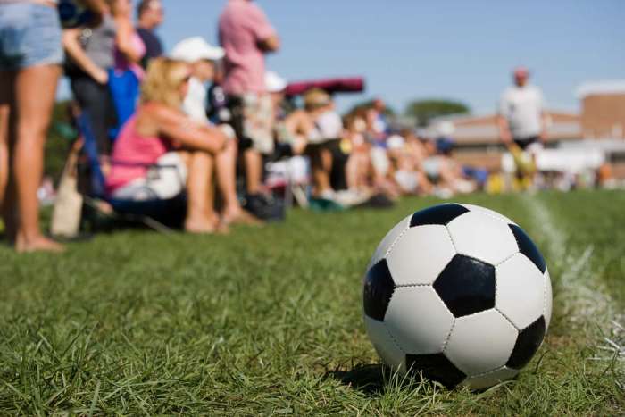 parents on sideline at kids soccer game