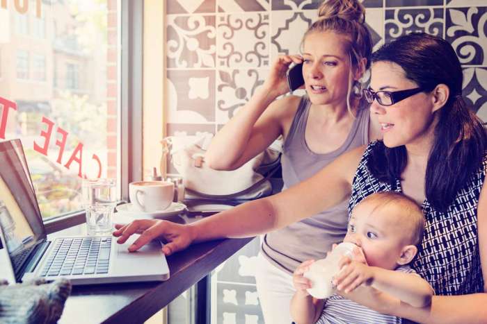 working moms in cafe with baby