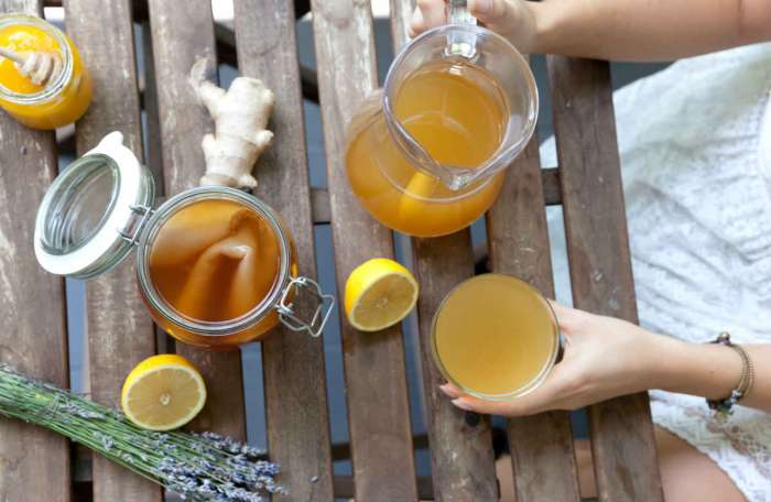 woman drinking kombucha while pregnant