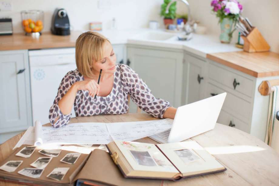 woman reading her Ancestry.com results