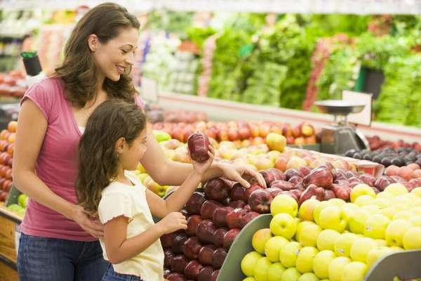 Woman and Daughter Shopping for Produce