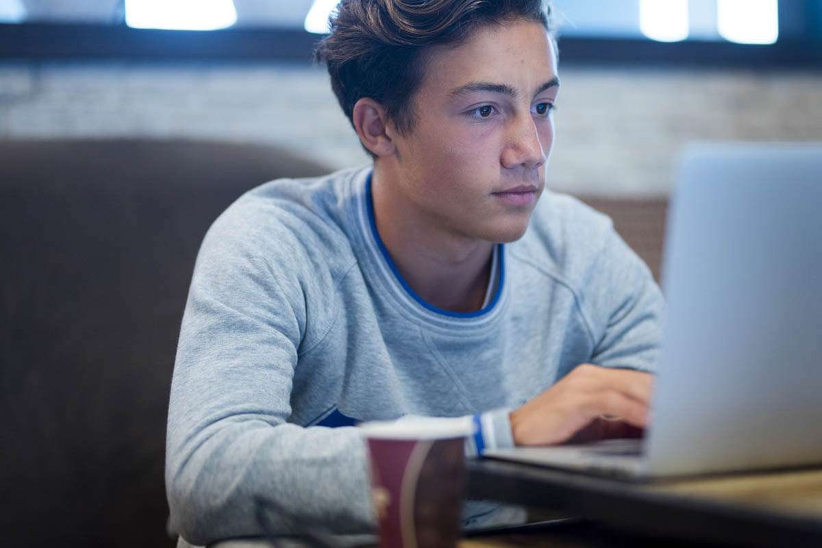 Teenager on Computer