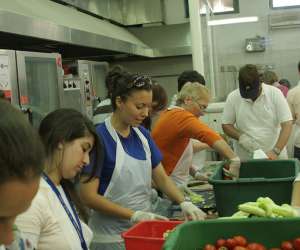 teens volunteering in soup kitchen