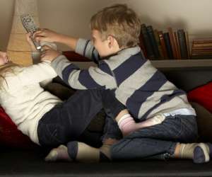 siblings fighting over the remote