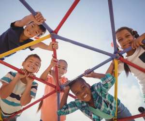 diverse group of kids on playground